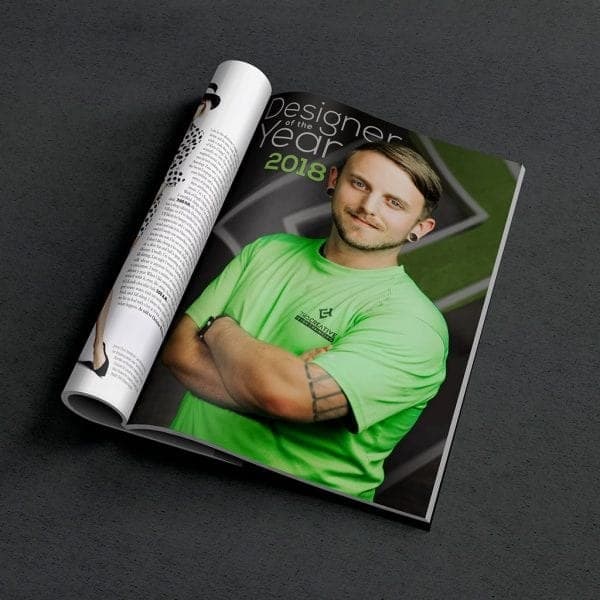 Weston Beckwith in a This Creative shirt on a mock magazine spread the studio made in 2018