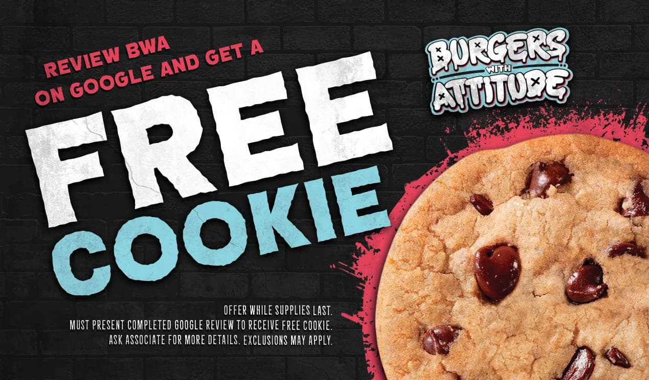 Rack card back for Burgers with Attitude: black brick background, torn-paper 'Free Cookie' headline, cookie photo.
